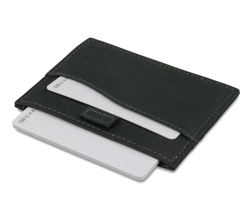 Open Leggera Card Holder Vintage in Carbon Black with cards pulling out.