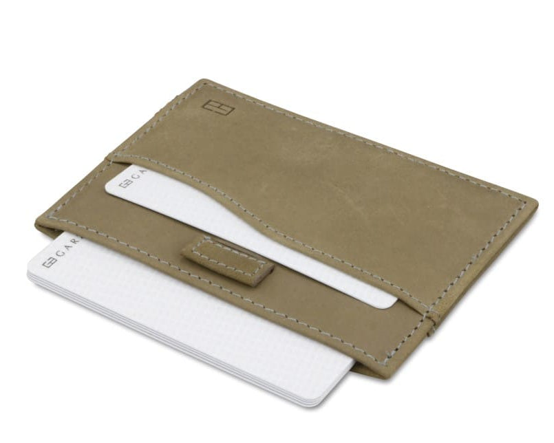 Open Leggera Card Holder Vintage in Metal Grey with cards pulling out.