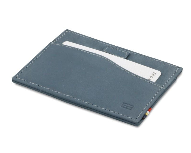 Front view of Leggera Card Holder Vintage in Sapphire Blue with a pull tab with a card.