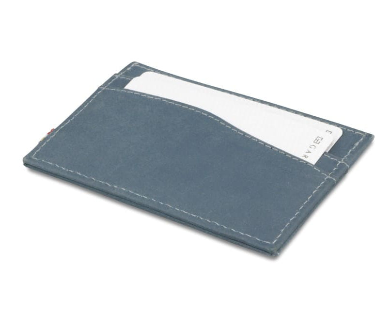 Back view of Leggera Card Holder Vintage in Sapphire Blue with cards inside.