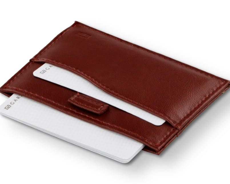 Open Leggera Card Holder Vegan in Cactus Burgundy with cards pulling out.