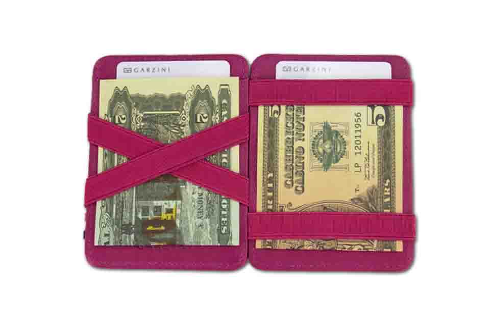 Open view of the Urban Magic Wallet in Raspberry with money. 
