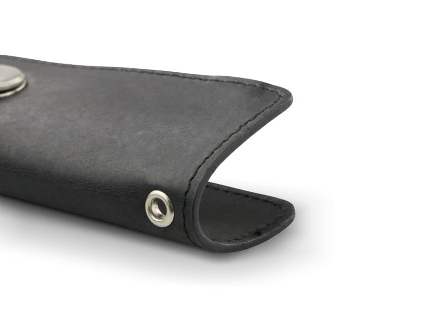 Close up view of the bottom side in Brushed Black with a key holder hole for a key holder ring.