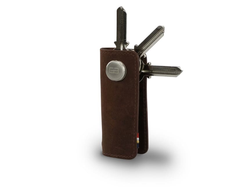 Side view of Lusso Vintage Key Holder in Brushed Brown with with a key holder ring and 3 keys.