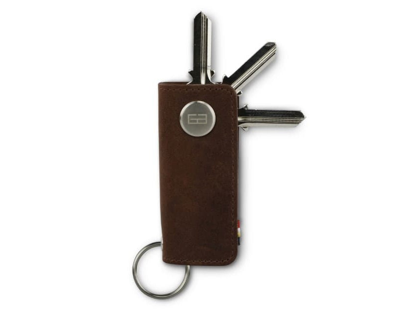 Front view of Lusso Vintage Key Holder in Brushed Brown with with a key holder ring and 3 keys.