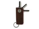 Front view of Lusso Vintage Key Holder in Brushed Brown with with a key holder ring and 3 keys.