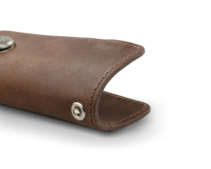 Close up view of the bottom side in Brushed Brown with a key holder hole for a key holder ring.