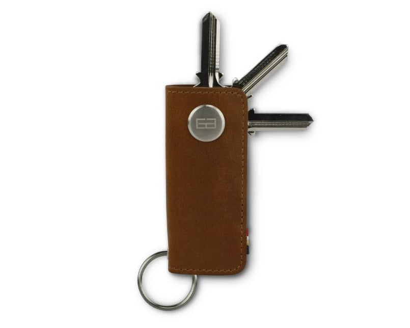 Front view of Lusso Vintage Key Holder in Brushed Cognac with with a key holder ring and 3 keys.