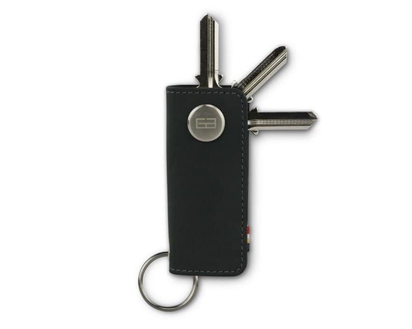 Front view of Lusso Key Holder in Carbon Black with with a key holder ring and 3 keys.