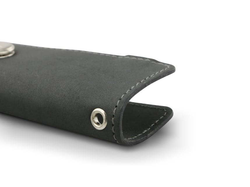 Close up view of the bottom side in Carbon Black with a key holder hole for a key holder ring.
