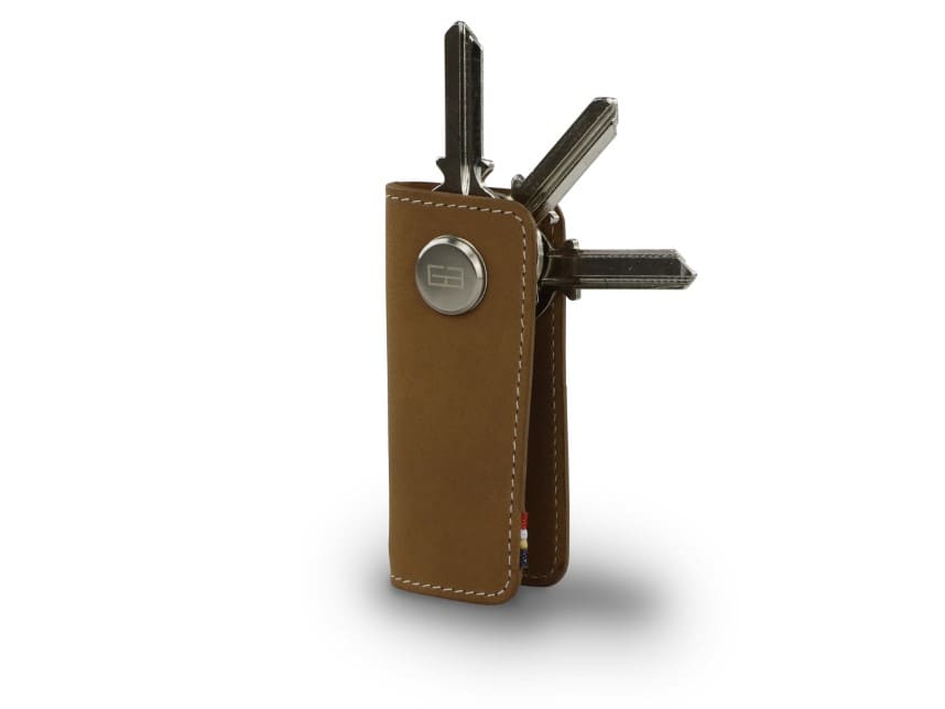 Side view of Lusso Key Holder in Camel Brown with with a key holder ring and 3 keys.