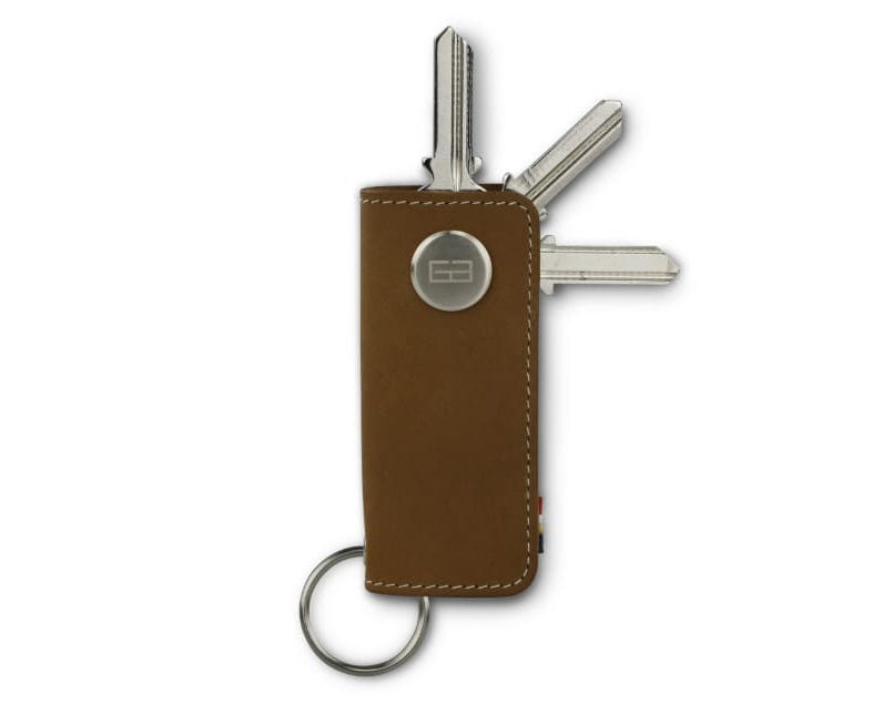Front view of Lusso Key Holder in Camel Brown with with a key holder ring and 3 keys.