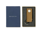 Front view of the Lusso Key Holder in Camel Brown in the box with the brand name Garzini.