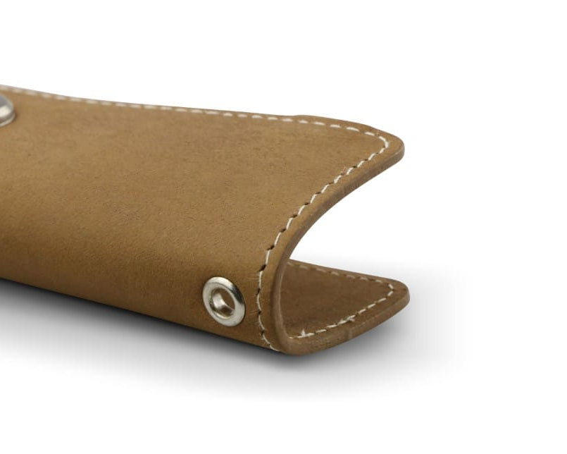 Close up view of the bottom side in Camel Brown with a key holder hole for a key holder ring.