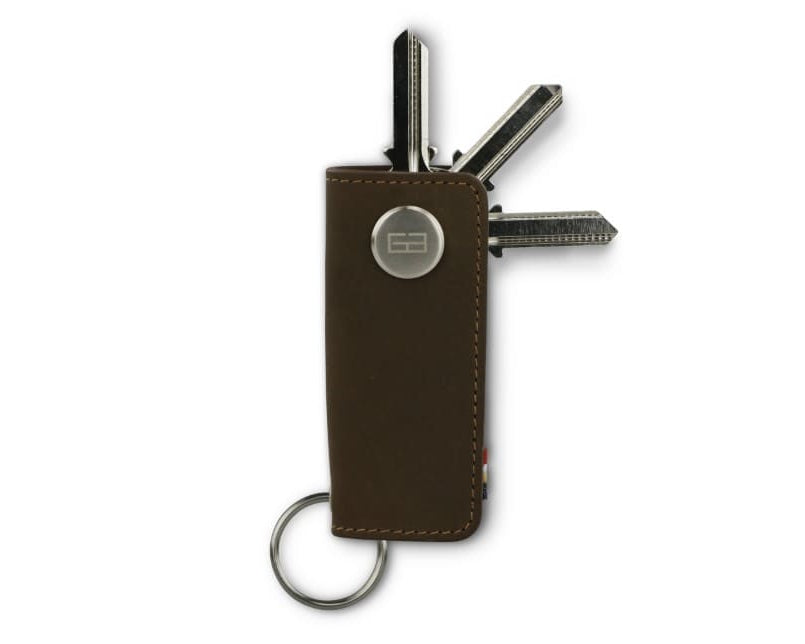 Front view of Lusso Key Holder in Java Brown with with a key holder ring and 3 keys.