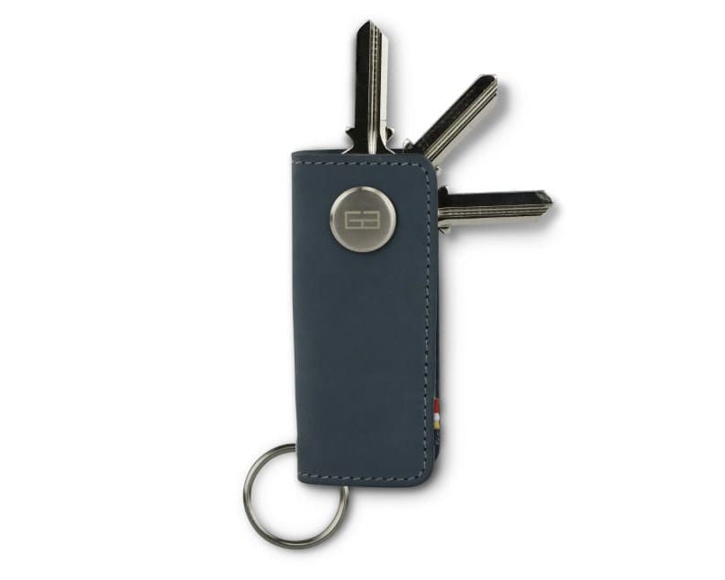 Front view of Lusso Key Holder in Sapphire Blue with with a key holder ring and 3 keys.