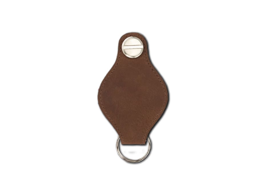 Back view of Lusso AirTag Key Holder in Brushed Brown with a key holder ring.