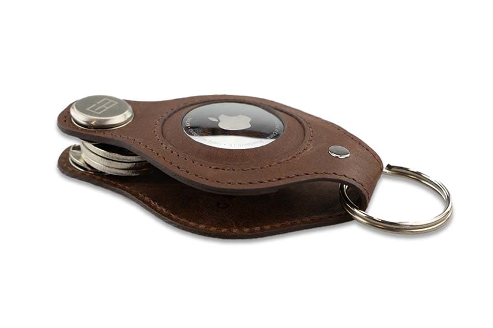 Side view of Lusso AirTag Key Holder in Brushed Brown with a key holder ring.
