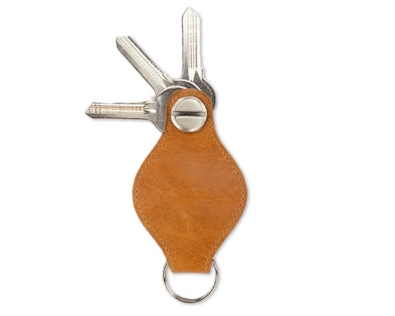 Back view of Lusso AirTag Key Holder in Brushed Cognac with a key holder ring and 3 keys.