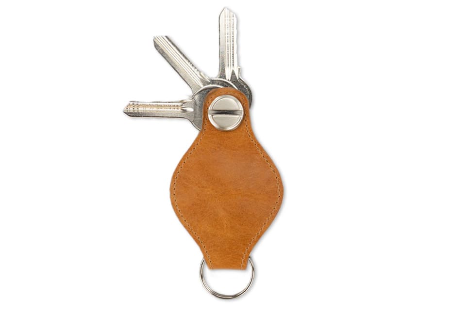 Back view of Lusso AirTag Key Holder in Brushed Cognac with a key holder ring and 3 keys.