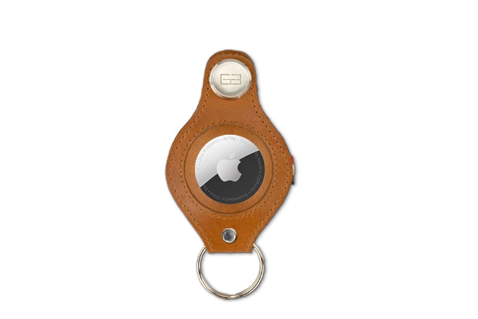 Front view of Lusso AirTag Key Holder in Brushed Cognac with a key holder ring.