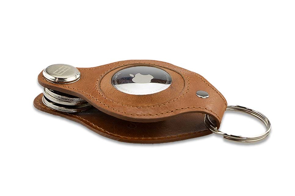 Side view of Lusso AirTag Key Holder in Brushed Cognac with a key holder ring.