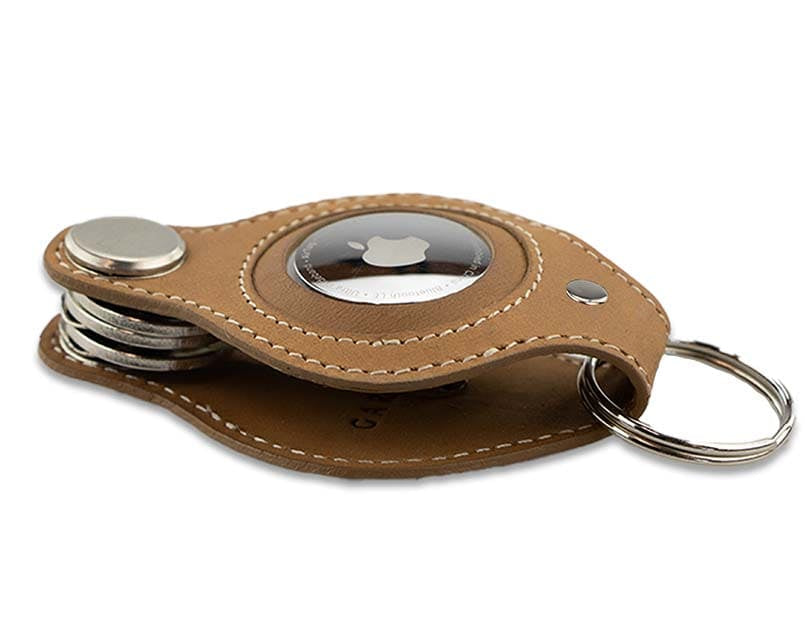 Side view of Lusso AirTag Key Holder in Camel Brown with a key holder ring.