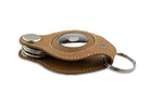 Side view of Lusso AirTag Key Holder in Camel Brown with a key holder ring.