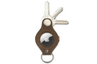 Front view of Lusso AirTag Key Holder in Java Brown with a key holder ring and 3 keys.