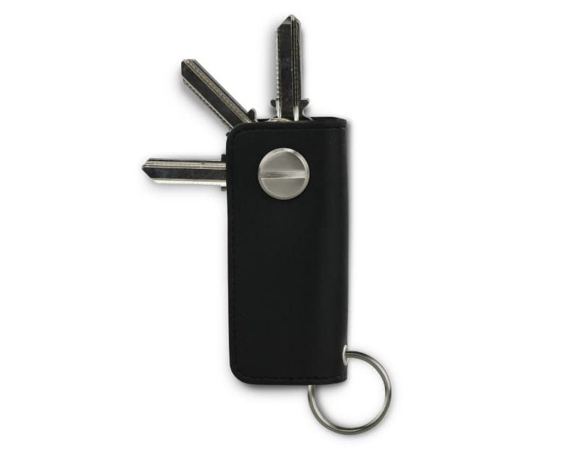 Back view of Lusso Key Holder Vegan in Cactus Black with with a key holder ring and 3 keys.