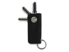 Back view of Lusso Key Holder Vegan in Cactus Black with with a key holder ring and 3 keys.