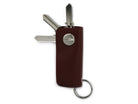 Back view of Lusso Key Holder Vegan in Cactus Burgundy with with a key holder ring and 3 keys.