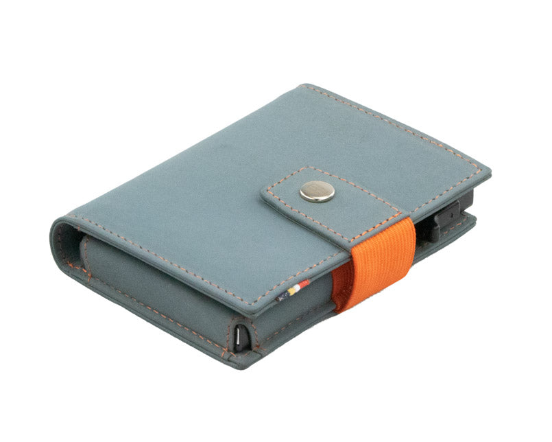 Closed Garzini Metal Wallet in blue leather with snap button and orange strap, viewed from an angle
