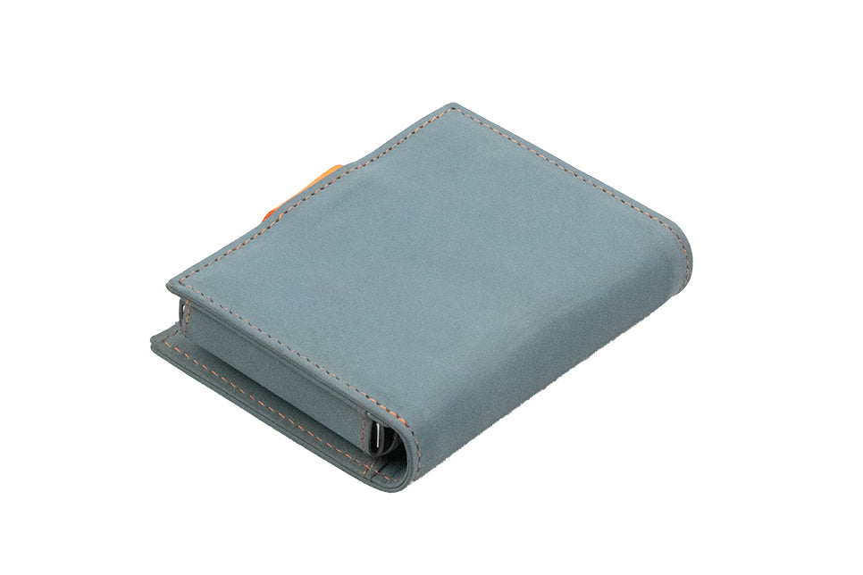 Back view of Garzini Metal Wallet in blue leather with orange stitching, showcasing a smooth finish