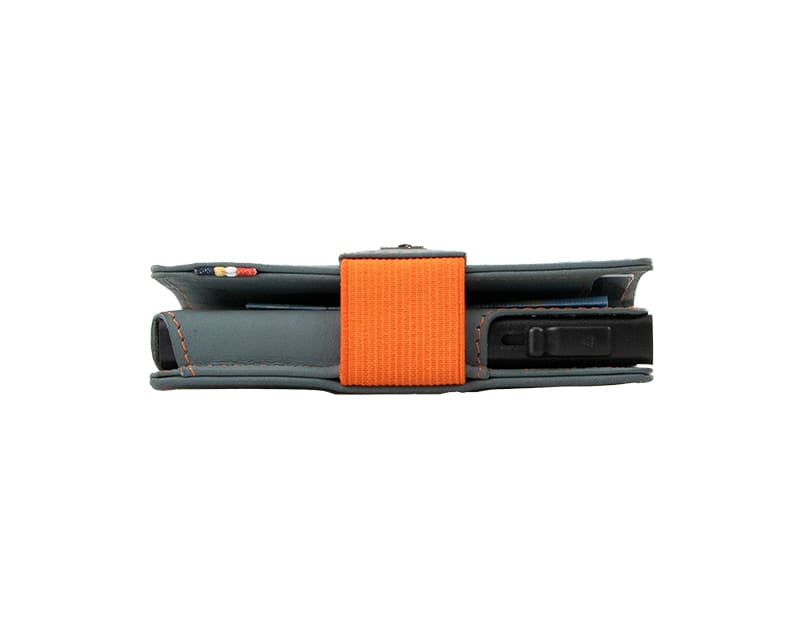 Side view of slim Garzini Metal Wallet in blue leather with orange elastic strap