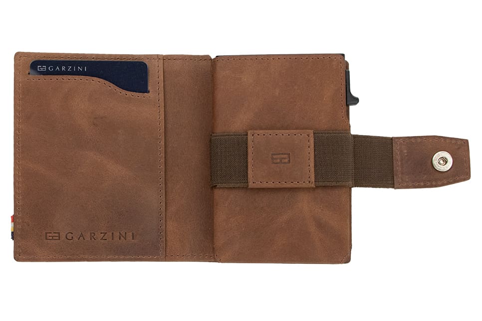 Open Garzini Metal Wallet in brushed brown leather, displaying card and cash slots