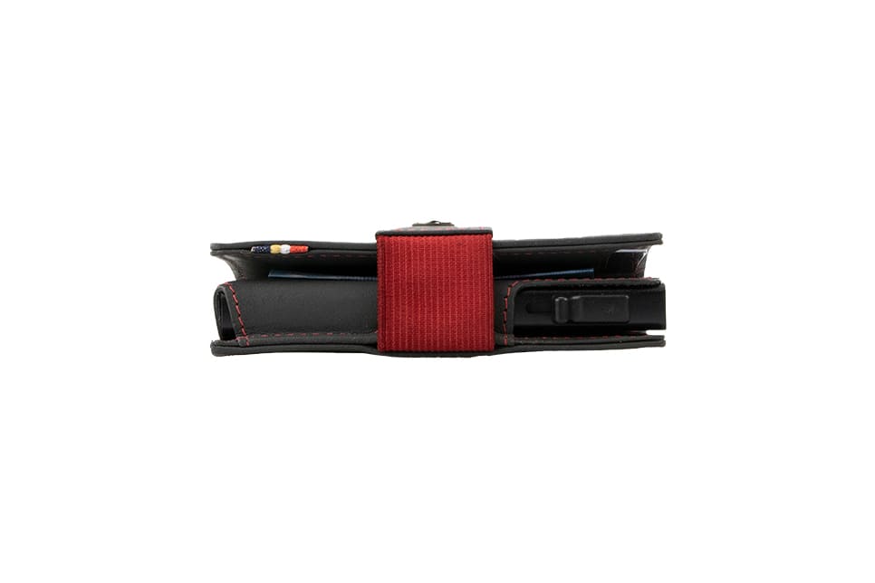 Side view of slim Garzini Metal Wallet in carbon red leather