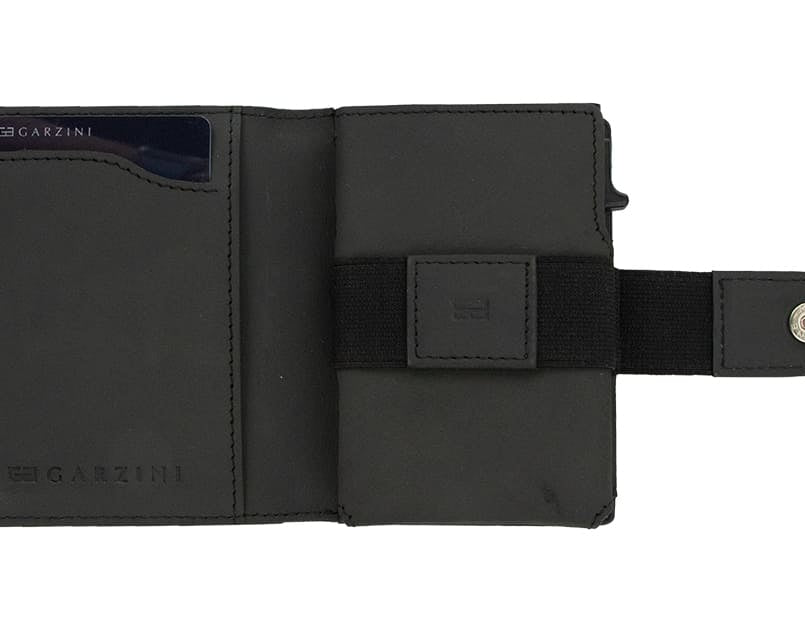 Open Garzini Metal Wallet in carbon black leather, displaying card and cash slots