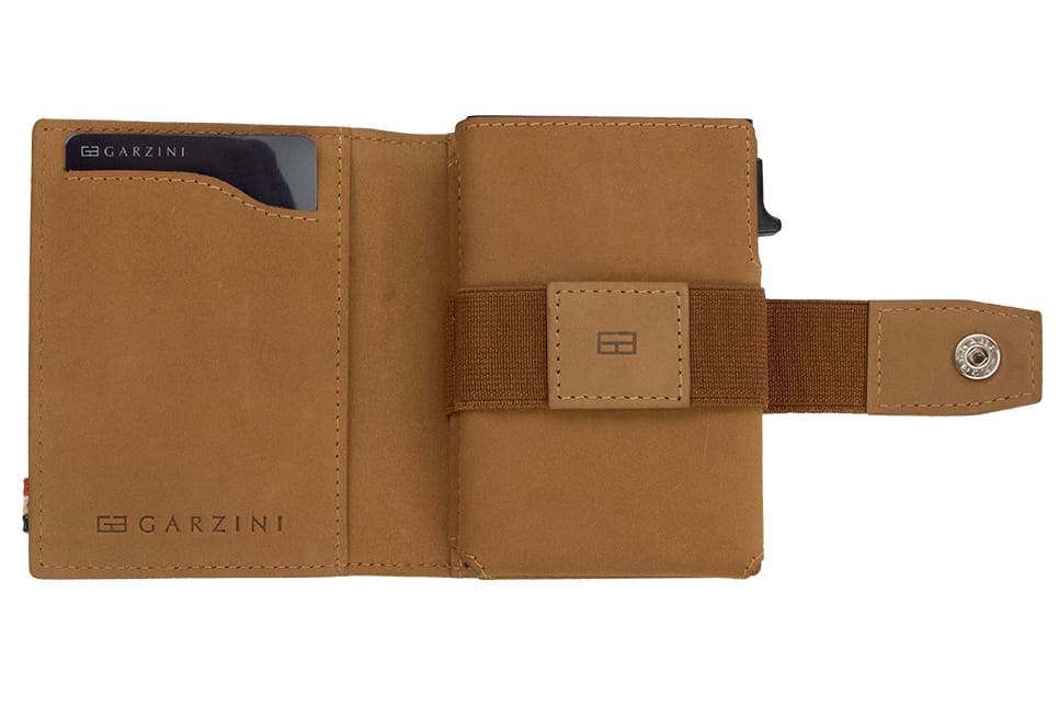 Open Garzini Metal Wallet in camel brown leather, displaying card and cash slots