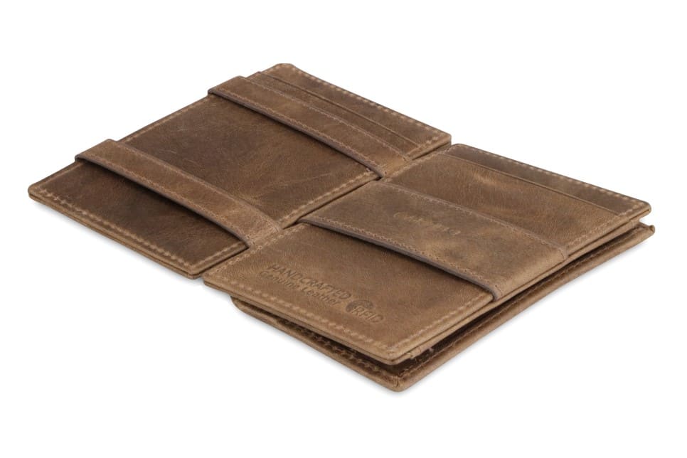 Open view of the  Essenziale Magic Coin Wallet Brushed in Brushed Brown with the money strap to secure money.