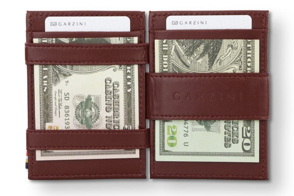 Open view of Essenziale Magic Coin Wallet Vegan in Cactus Burgundy with money inside.