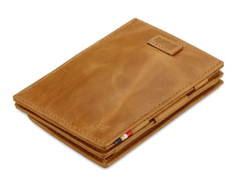 Front view of Cavare Magic Coin Wallet Card Sleeve Brushed in Brushed Cognac with pull tab.