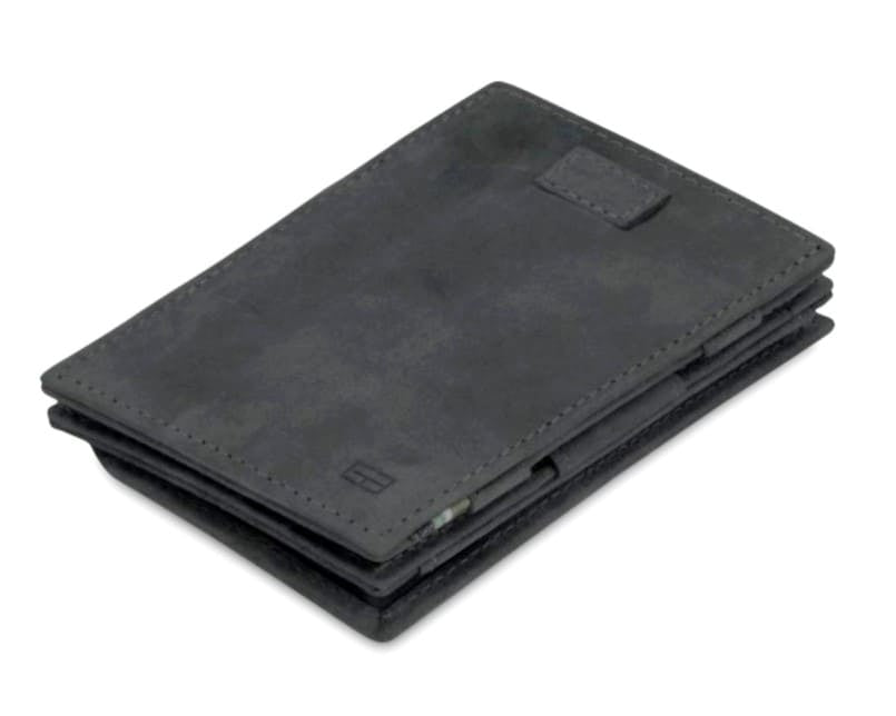 Front view of Cavare Magic Coin Wallet Card Sleeve Vintage in Carbon Black with pull tab.
