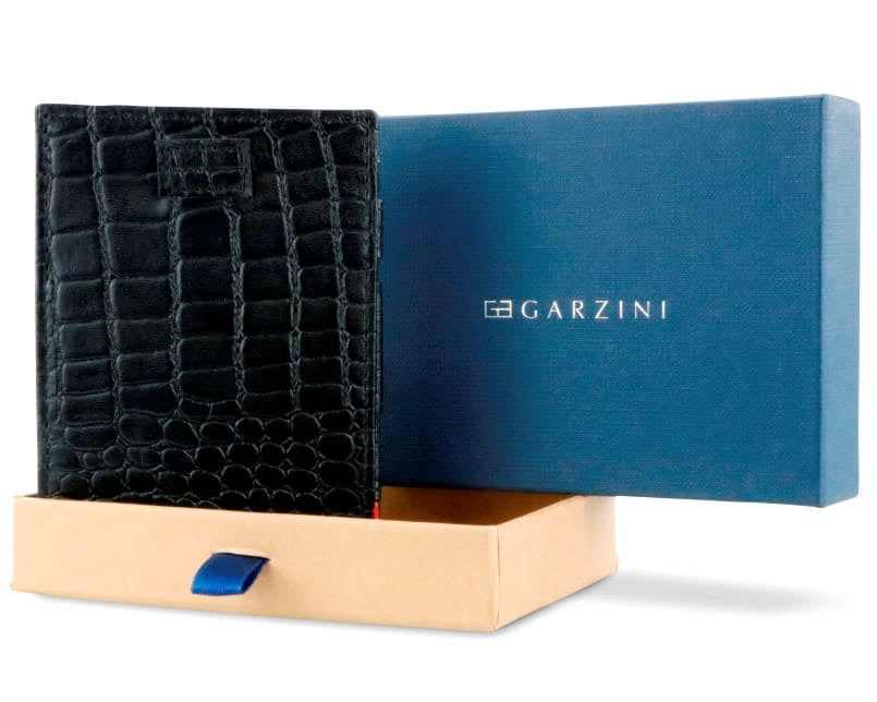 Half-open blue box with Garzini brand name Inside the box, the Black wallet is wrapped in tissue paper, placed in a light cardboard box with a blue strap.