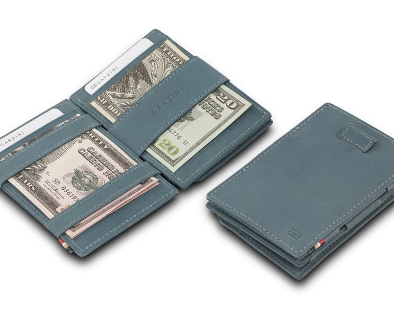 Front and open view of Cavare Magic Coin Wallet Card Sleeve in Sapphire Blue with pull tab, coin pocket, and money straps.