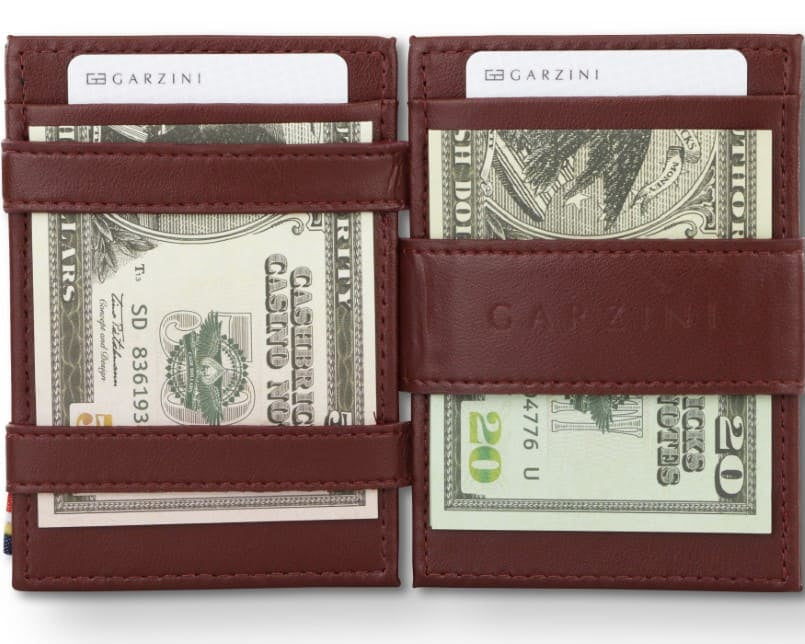 Open view of the Essenziale Magic Wallet ID Window Vegan in Cactus Burgundy with money inside.