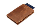 Front view of Cavare Magic Wallet Brushed in Brushed Brown with pull tab and card pulling out.