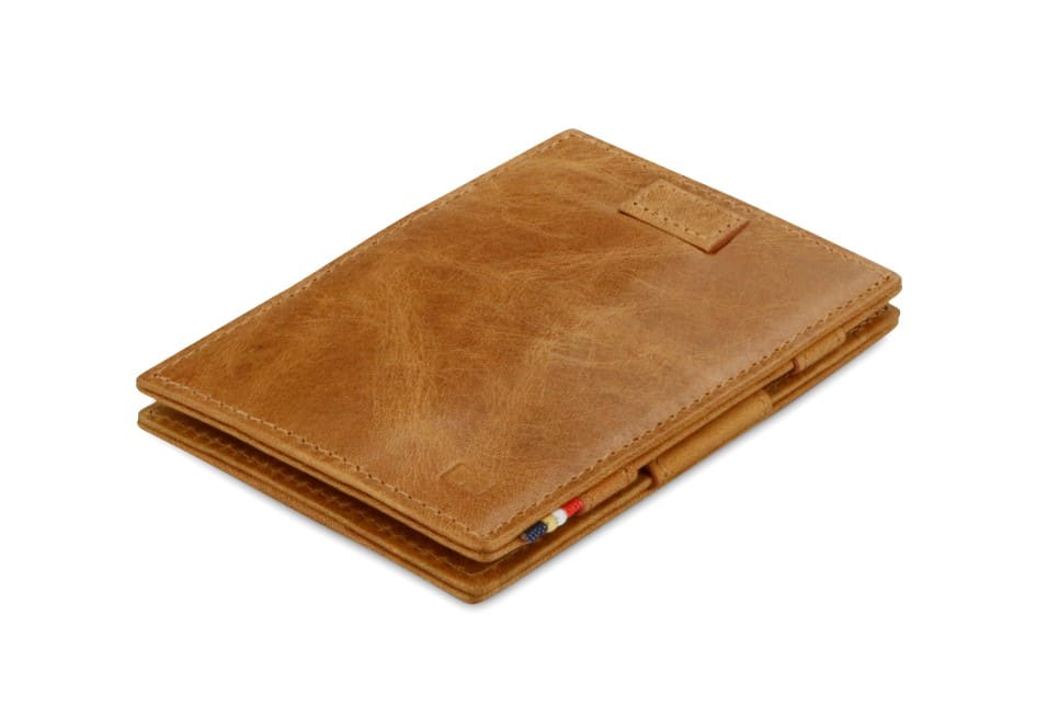 Front view of Cavare Magic Wallet Brushed in Brushed Cognac with pull tab.