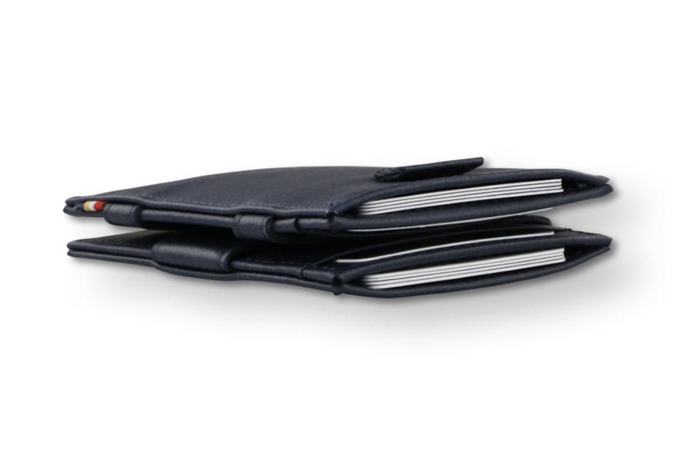 Side view of the Cavare Magic Wallet Card Sleeve Cactus in Cactus Blue with cards inside.