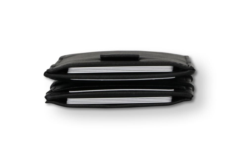 Top view of the Cavare Magic Wallet Card Sleeve Cactus in Cactus Black with cards inside.